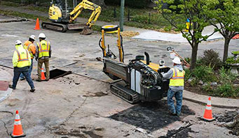 Construction workers doing a directional drilling crossing in a construction