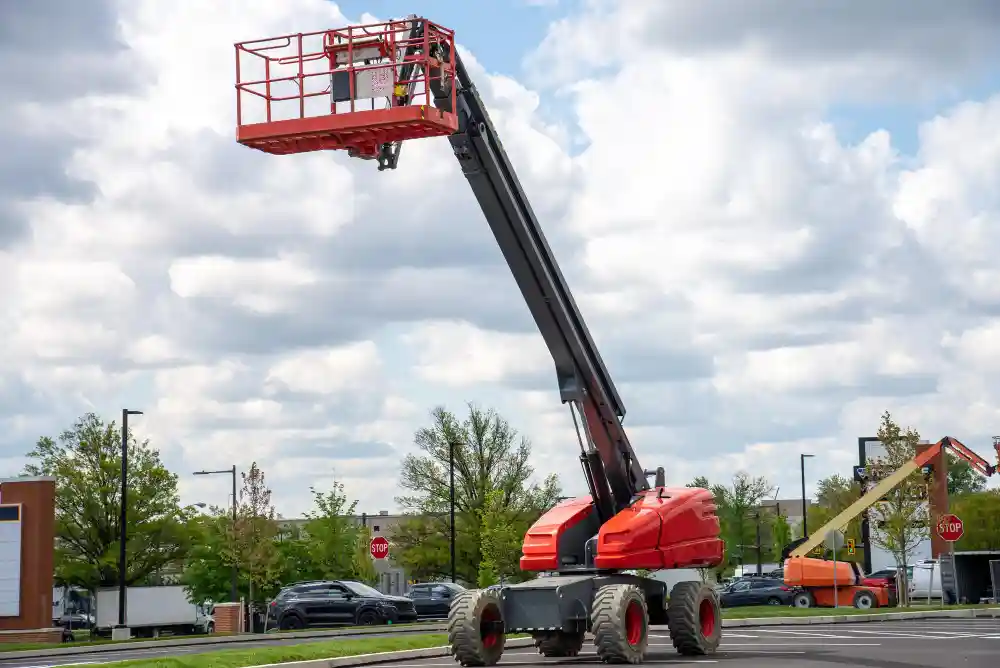 Articulating boom lift at an active Atascadero job site