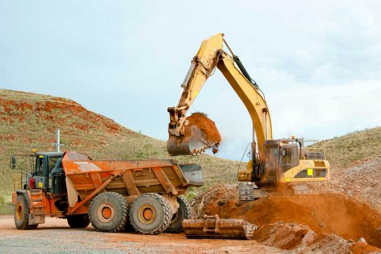 Earthmoving machinery operating on a Ft. Myers construction project