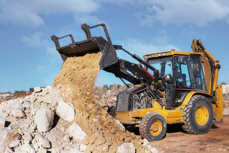 Earthmoving machinery operating on a Post Falls construction project