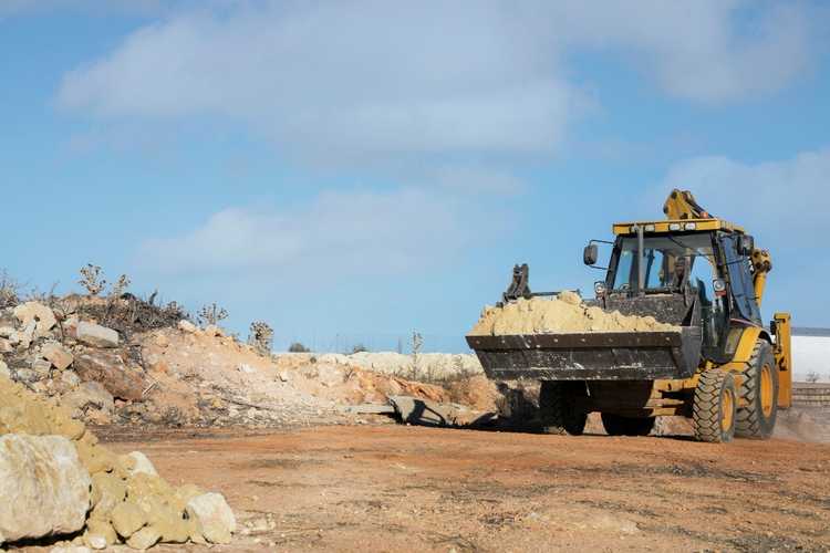Earthmoving machinery operating on a Salida construction project