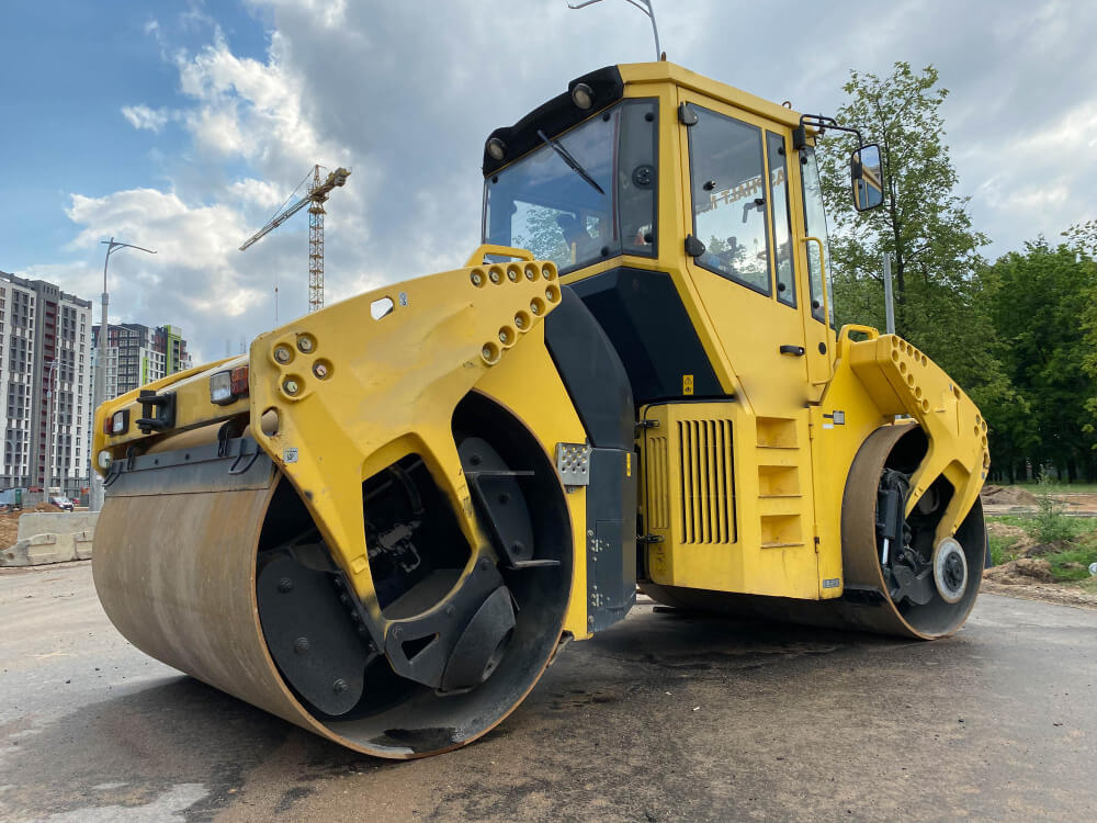 Excavator and lift equipment used in Wake Forest construction projects