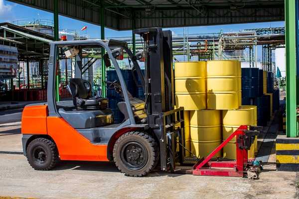 Forklift handling materials at an active Ft. Myers job site